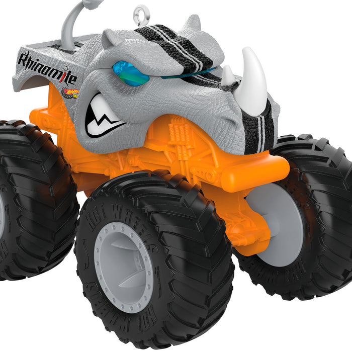 Toy monster truck with a rhino design on a white background