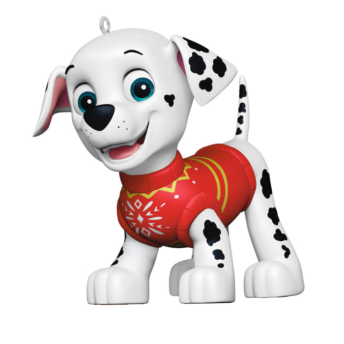 Toy figure of a dalmatian dog wearing a red sweater on a white background