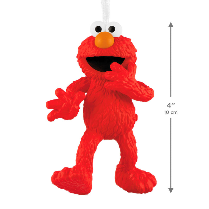 Elmo figurine with measurement label on a white background