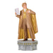 Statue of a person in formal attire with a cape holding a piece of paper on a white background