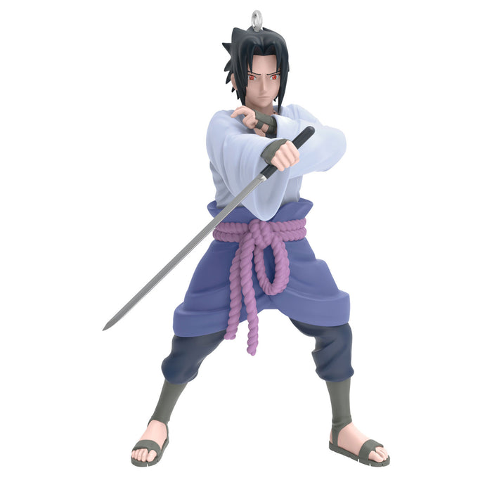 Anime character figurine in a dynamic pose with a sword on a white background