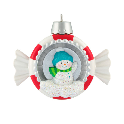 Christmas ornament with a snowman inside a life preserver on a white background
