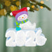 Christmas ornament with a snowman and '2026' on a blurred Christmas tree background