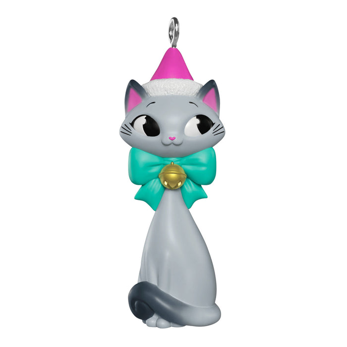 Cat-shaped ornament with a pink hat and green bow on a white background