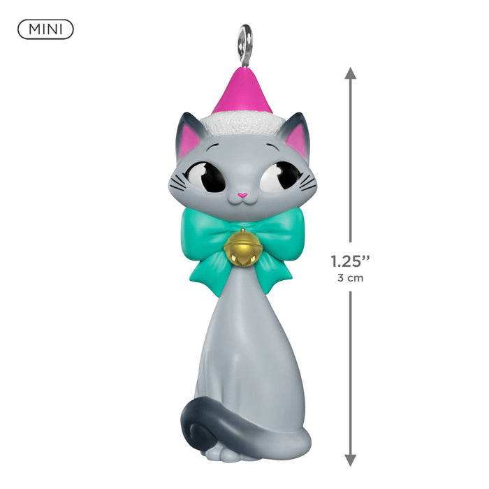 Cat-shaped ornament with a pink hat and green bow, featuring dimensions on a white background.