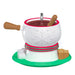 White fondue pot with snowflake design, brown handles, and green base on a white background