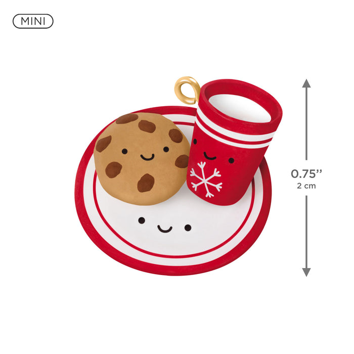 Miniature Christmas-themed set with a cookie, cup, and plate on a white background