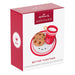Hallmark Keepsake Christmas ornament packaging with cookie and cup design on a white background