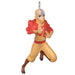 Animated character ornament with red and yellow outfit on a white background