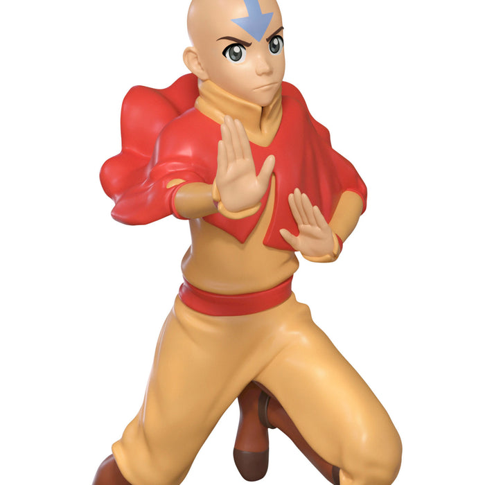 Animated character figure in red and beige outfit with blue symbol on head against white background