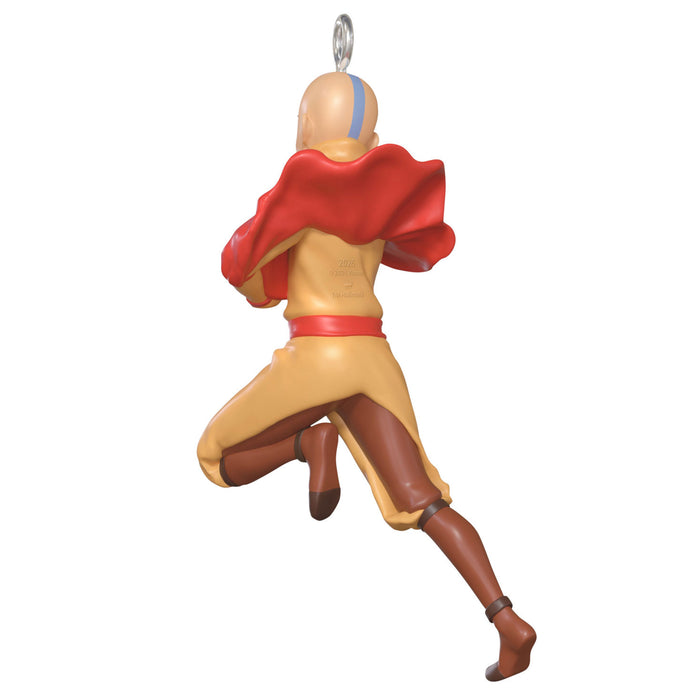 Figurine of a character with a red cape and yellow outfit on a white background