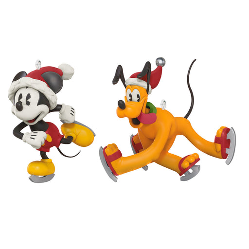 Two animated characters, one resembling a mouse and the other a dog, wearing Santa hats on a white background.