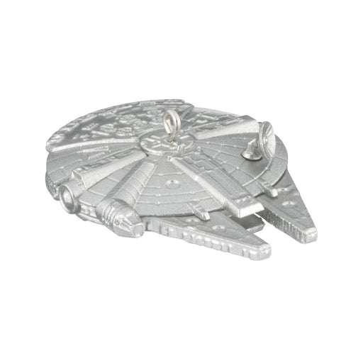 Metallic model of a spaceship on a white background