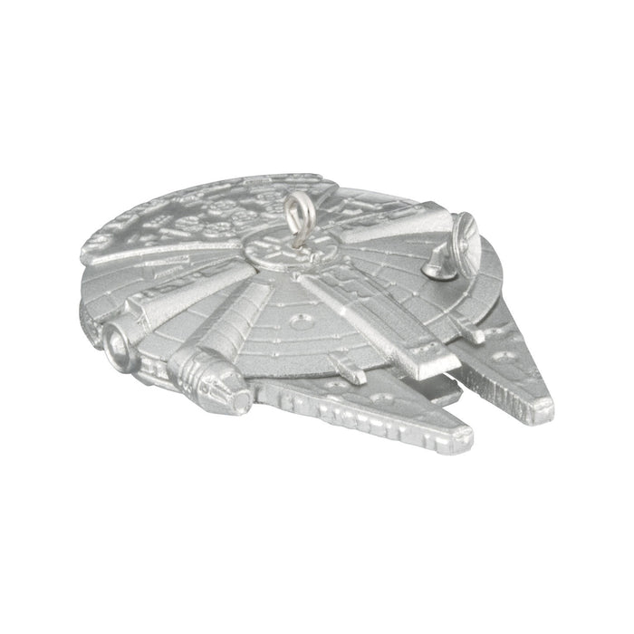 Metallic model of a spaceship on a white background