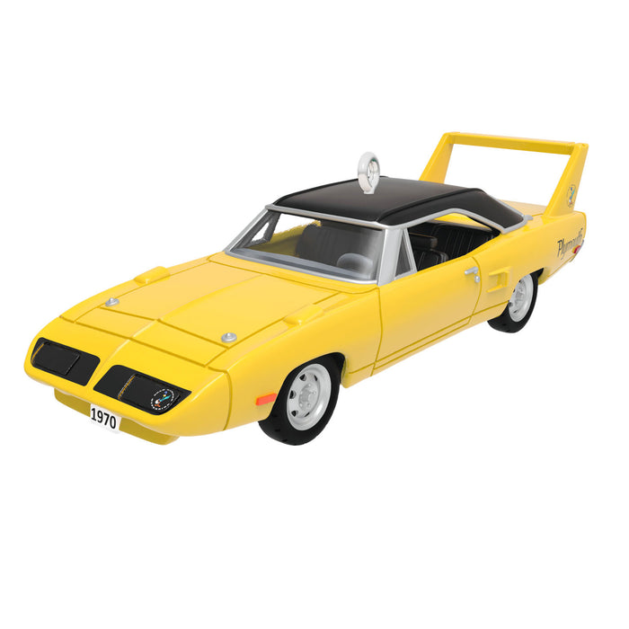 Yellow model car with black roof on a white background