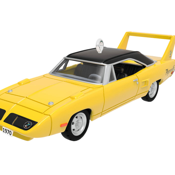 Yellow model car with black roof on a white background