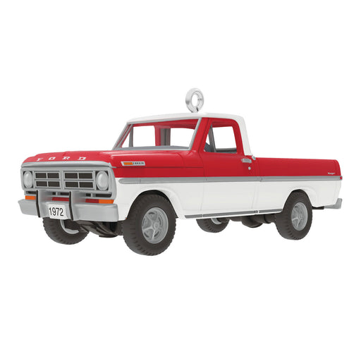 Model of a red and white Ford truck on a white background