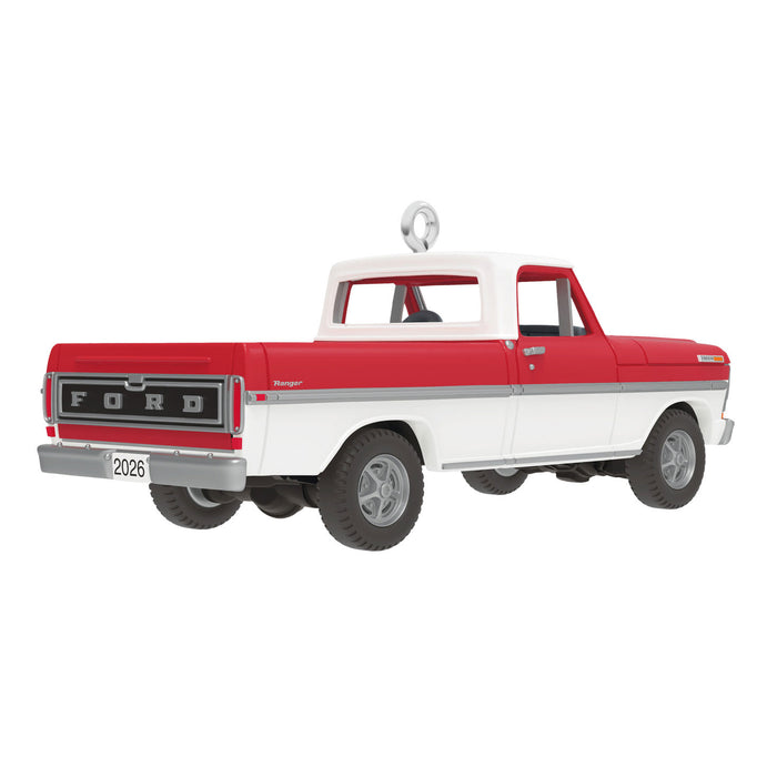 Model of a red and white Ford truck on a white background