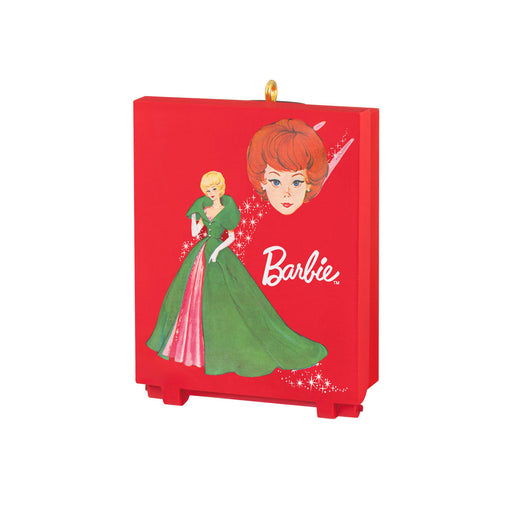 Barbie ornament with a red background featuring the Barbie character in a green dress.