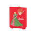 Barbie ornament with a red background featuring the Barbie character in a green dress.