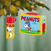 Peanuts-themed lunch box and thermos hanging from a Christmas tree.