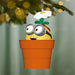 Decorative ornament shaped like a character in a pot with a flower, hanging on a tree branch.