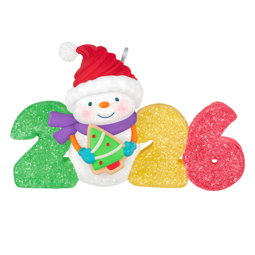 Decorative ornament with a snowman holding a Christmas tree cookie, surrounded by colorful numbers on a white background.