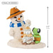 Decorative snowman figurine with a hat, scarf, and turtle, with a measurement label on a white background.