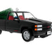 Black truck ornament with a Christmas tree in the bed on a white background