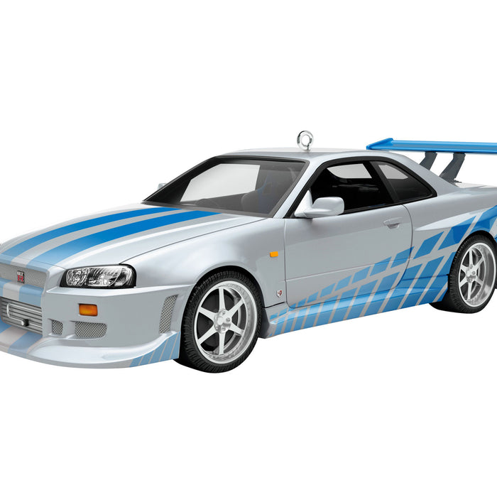 Silver sports car with blue stripes on a white background