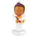 Decorative angel figurine with a child holding a paintbrush and palette on a white background