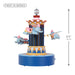 Toy figure of Dumbo on a carousel with height measurement on a white background