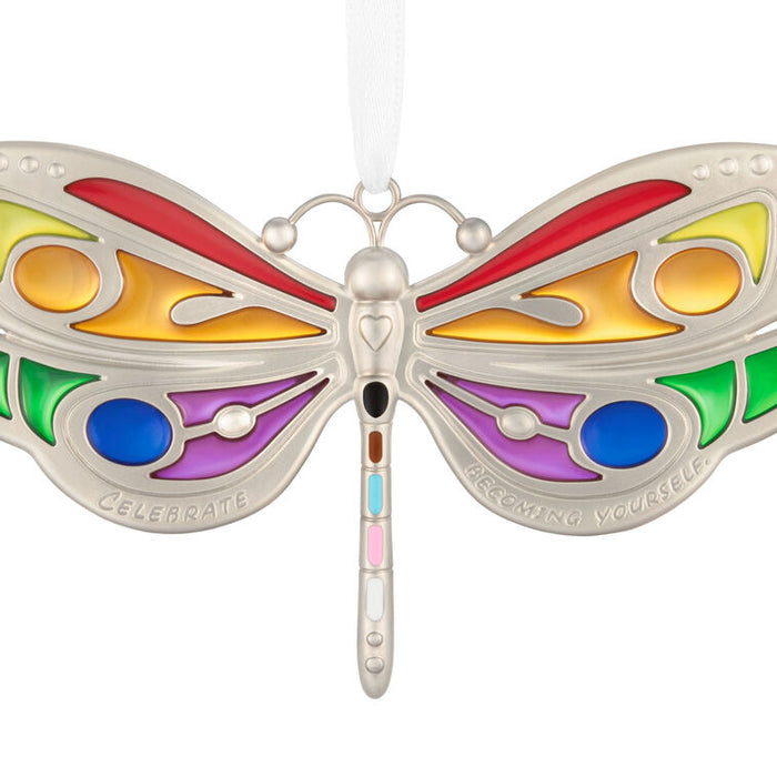 Colorful butterfly-shaped object with multicolored wings on a white background