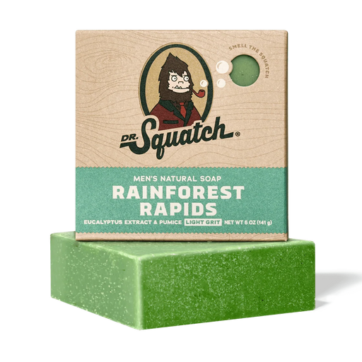 Green bar of soap with Dr. Squatch packaging on a white background