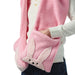 Pink fleece blanket with bunny ears held by a person wearing a white shirt.