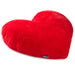 Red heart-shaped pillow on a white background