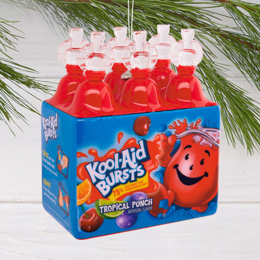 Kool-Aid Bursts Tropical Punch packaging hanging against a white background with greenery.