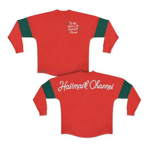 Red long-sleeve shirt with green accents featuring 'Hallmark Channel' text on a white background