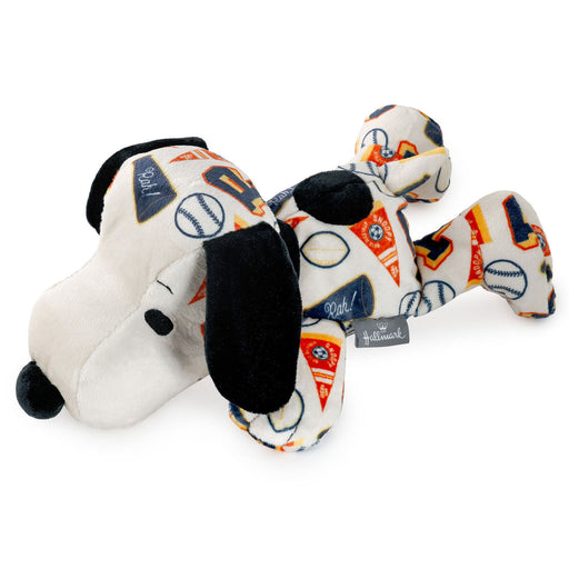 Plush dog toy with colorful patterns on a white background