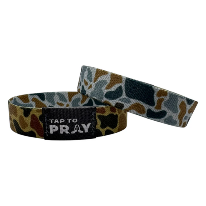 Wristband with floral pattern and 'Tap to Pray' text on a white background