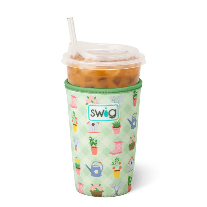 Green cup with gardening-themed design and 'swig' branding on a white background