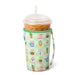 Tumbler with a garden-themed sleeve on a white background
