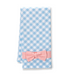 Blue and white checkered towel with a pink bow on a white background