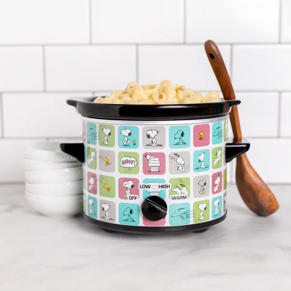 Small slow cooker with colorful design on a kitchen counter