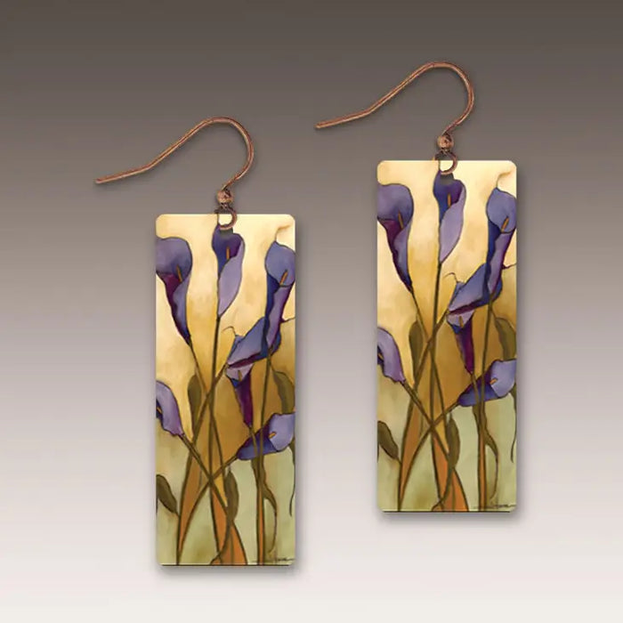 Pair of earrings with floral design on a gradient background