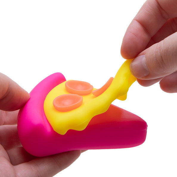 Pink and yellow toy resembling a pizza slice held by hands against a white background