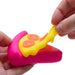 Pink and yellow toy resembling a pizza slice held by hands against a white background