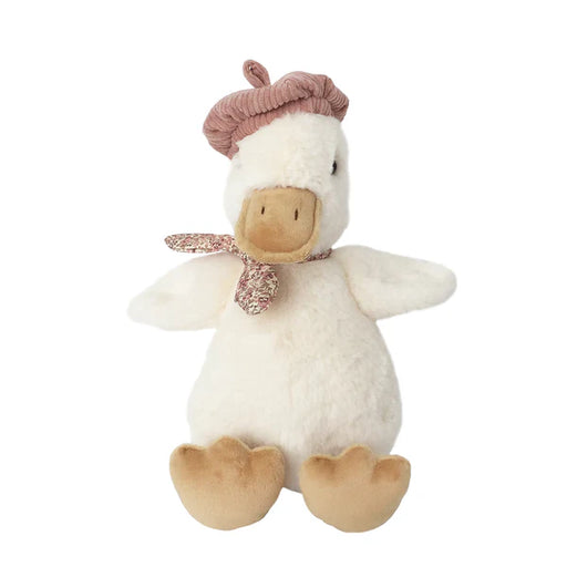 Plush toy duck with a pink hat and bow on a white background