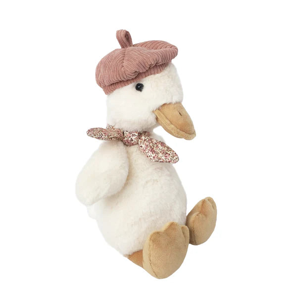 Plush duck toy with a brown hat and bow tie on a white background