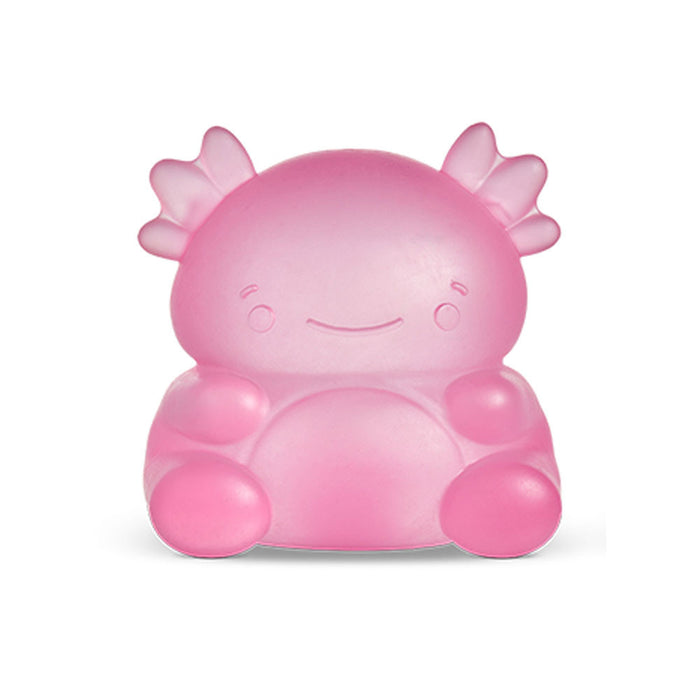 Pink axolotl-shaped night light on a white background